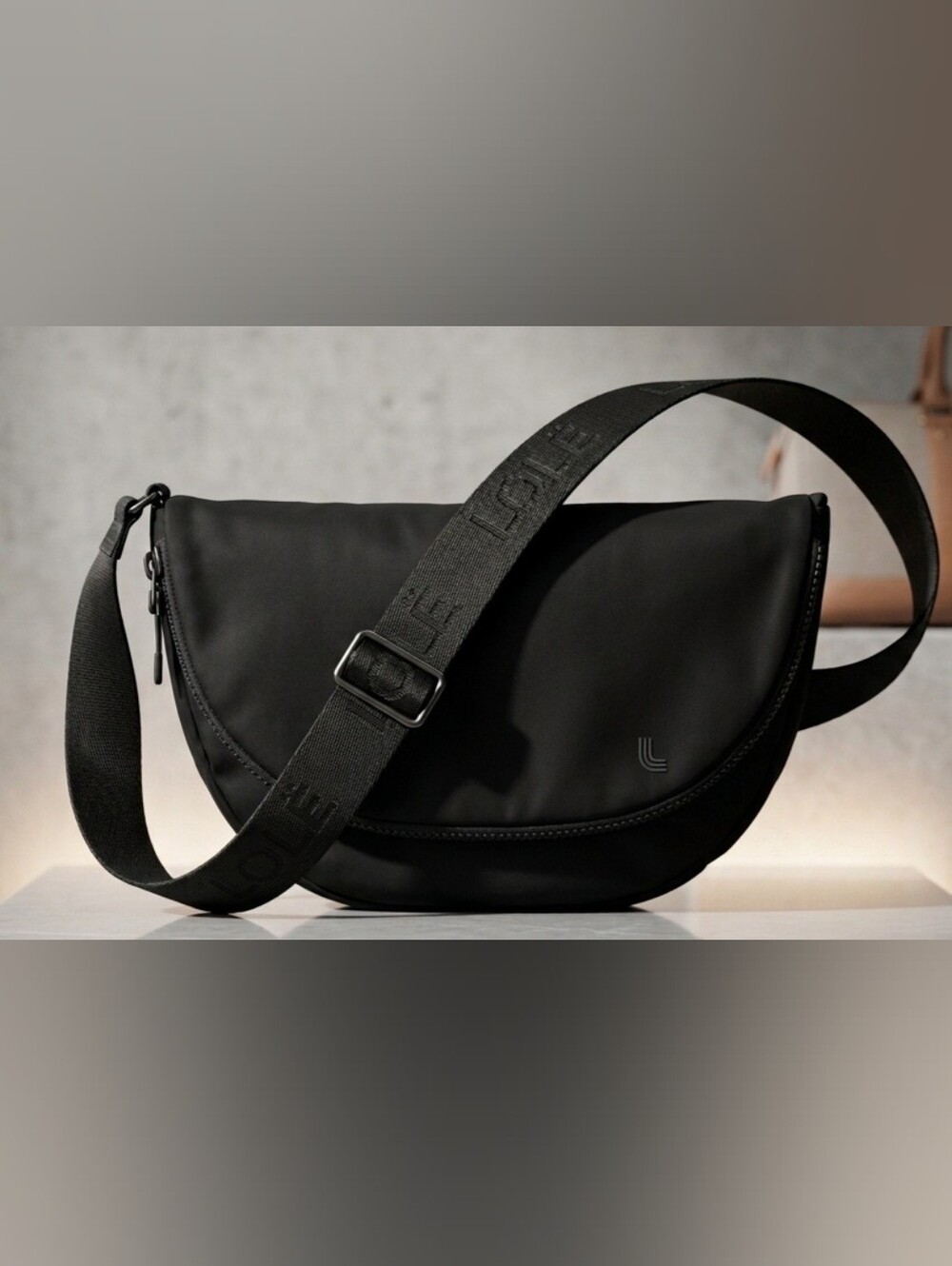 Lolë Black Crescent Crossbody Belt Bag / Sling Purse. It's Has A Little Gift